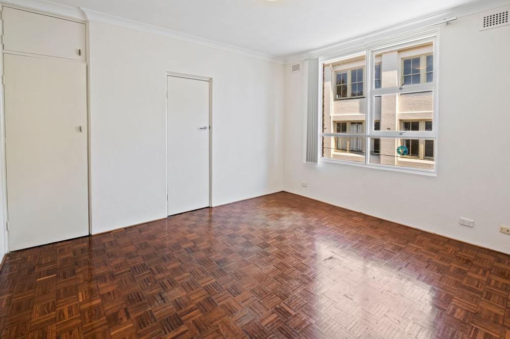 Bright and Airy Apartment on Prized Top Floor in Perfect Village Location